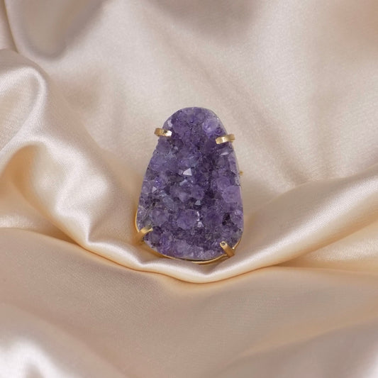 Introducing our exquisite Amethyst Ring – a masterpiece that captures the essence of elegance and spirituality in a single piece of jewelry.